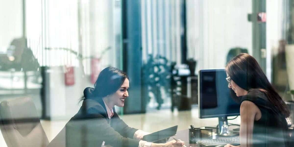 Stock image of two women in office