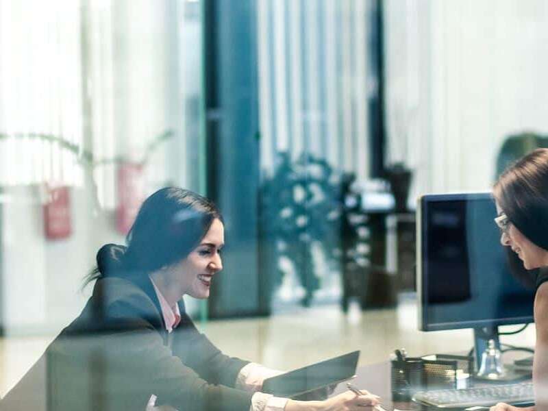 Stock image of two women in office