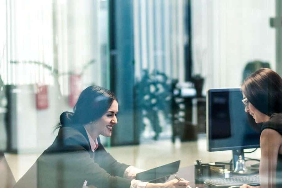 Stock image of two women in office