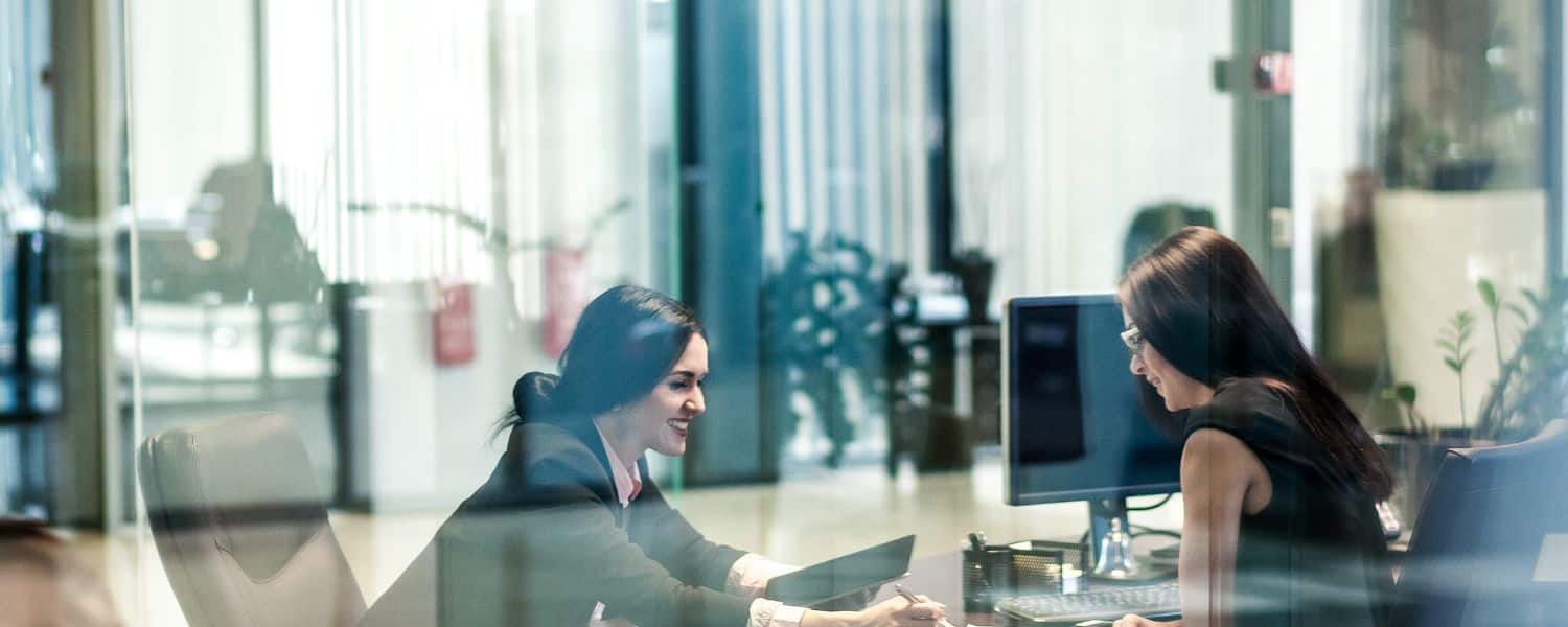 Stock image of two women in office